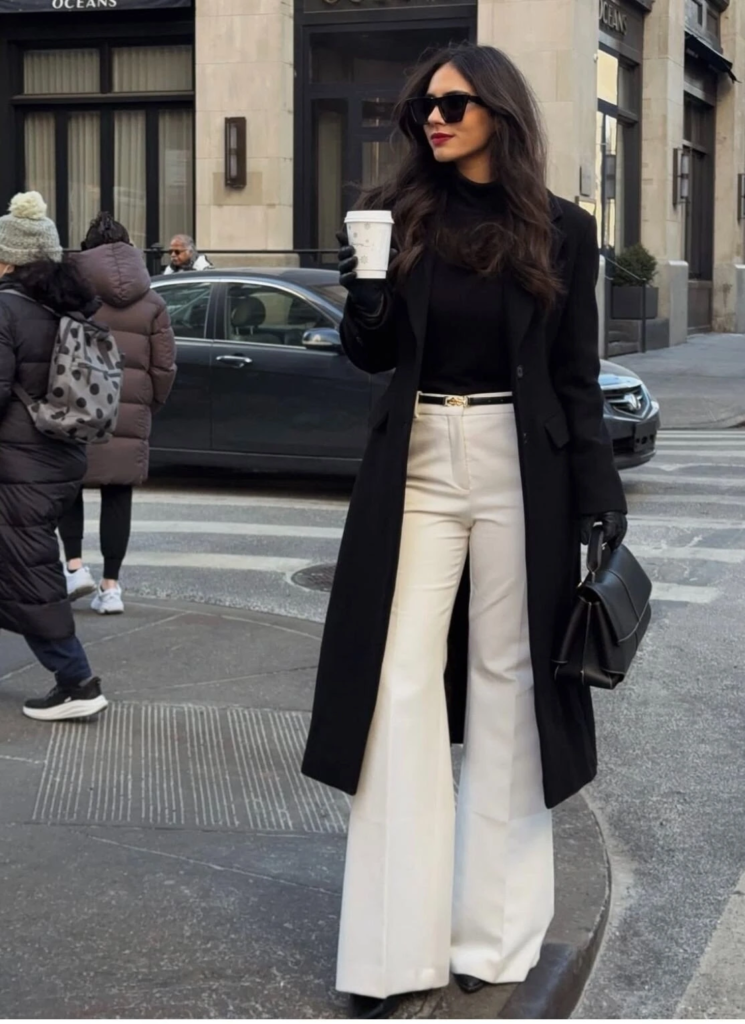 Classic Black Coat with Cream Trousers