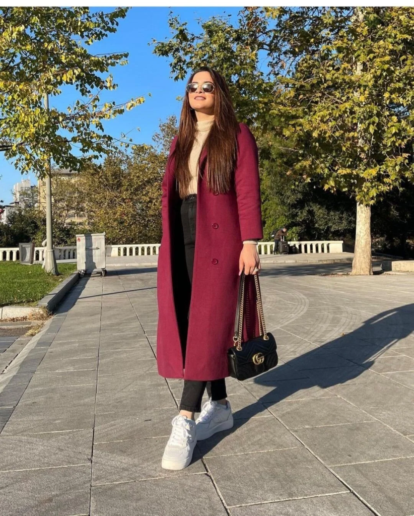Burgundy Coat with Cropped Trousers and Sneakers