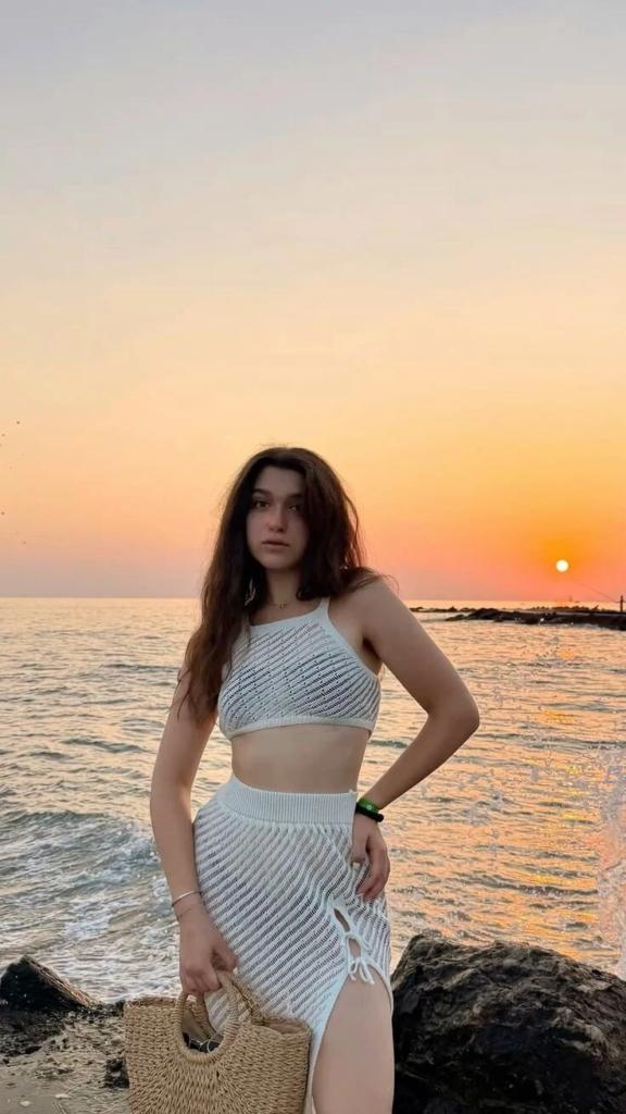 white textured knit beach outfit set with crop top and high waist skirt