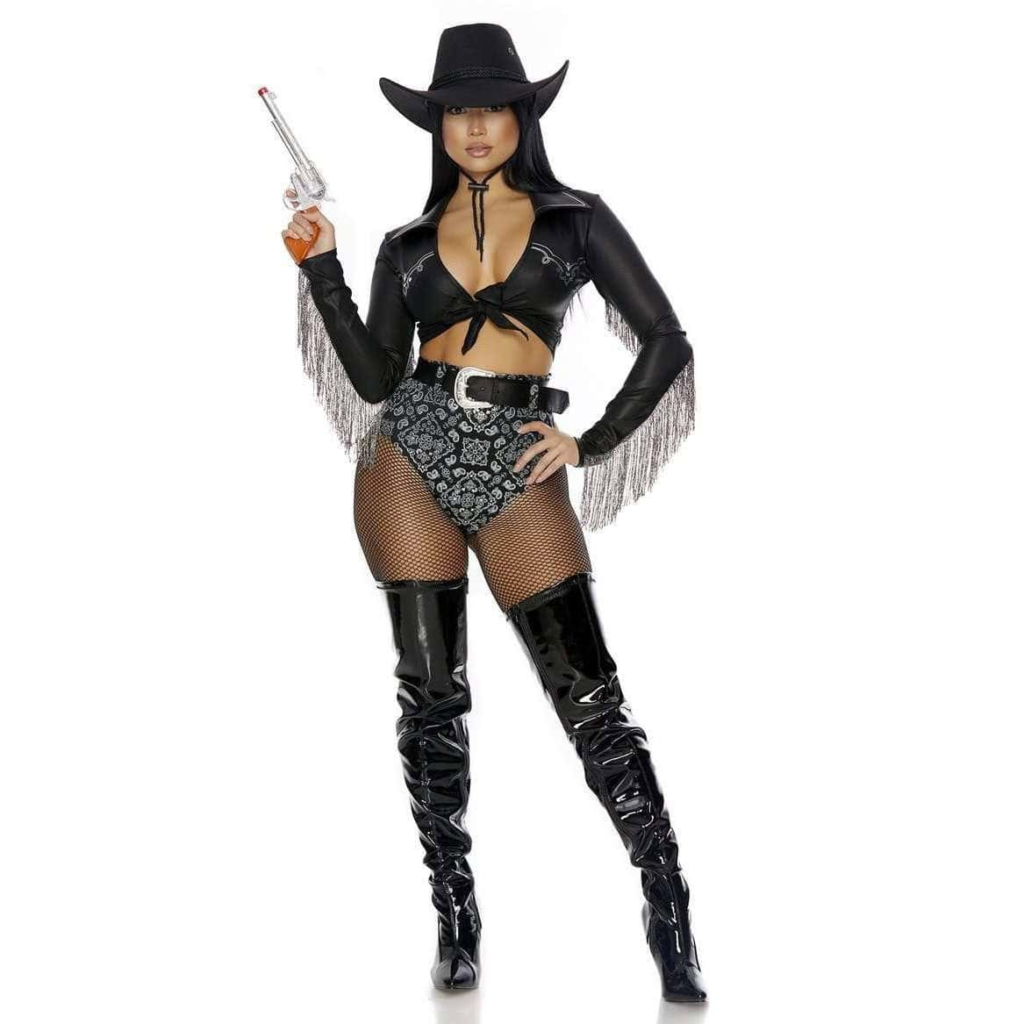 Black fringe cropped jacket styled with patterned bottoms, thigh-high boots, and cowboy hat for a bold baddie cowgirl outfit.
