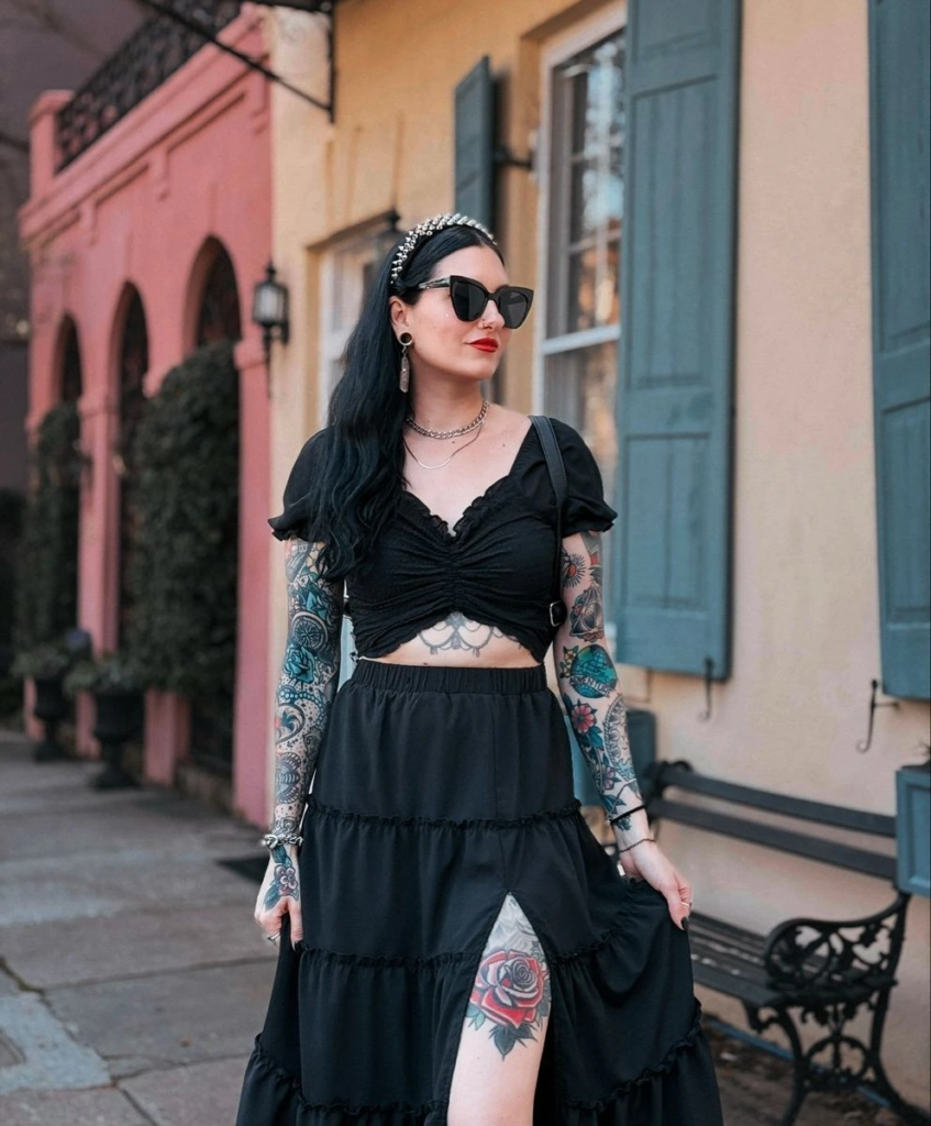 Black wrapped crop top with ruffled tiered maxi skirt and crystal headpiece in a moody boho goth outfit