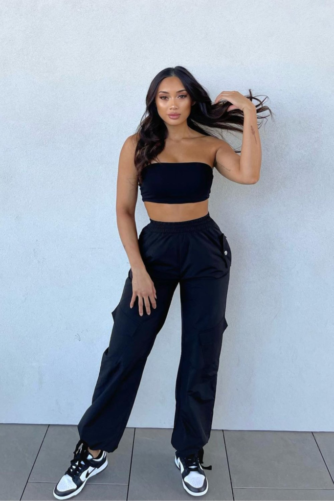 With a Black Tube Top and Black Sneakers