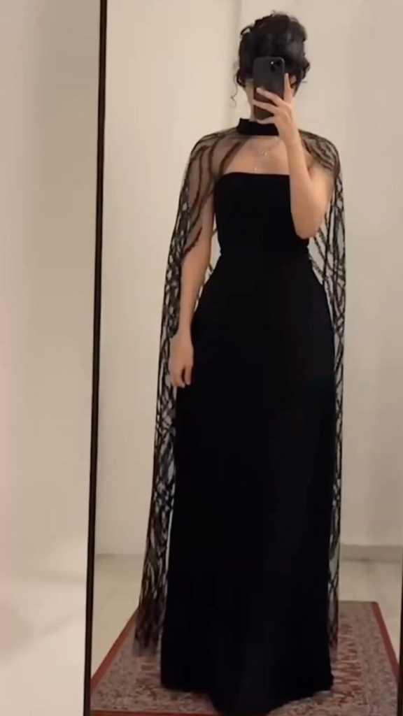 Elegant Black Gown with Sheer Cape