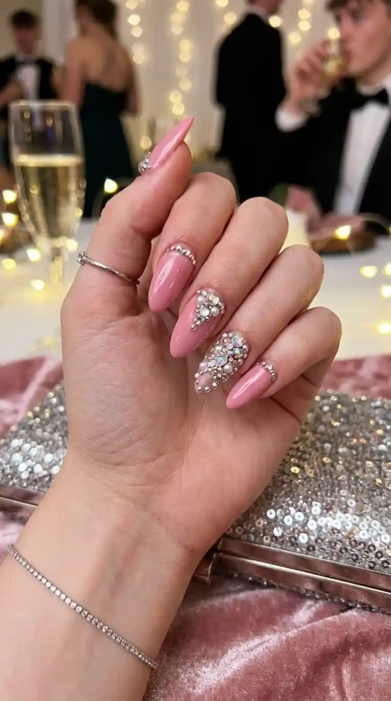 20. Pink Rhinestone Accent Almond Nails